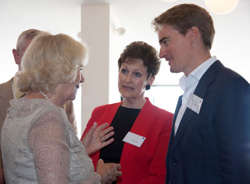 Duchess of Cornwall chats with Betty Hale, Roger Furniss and Will Ashworth at Fifteen Cornwall